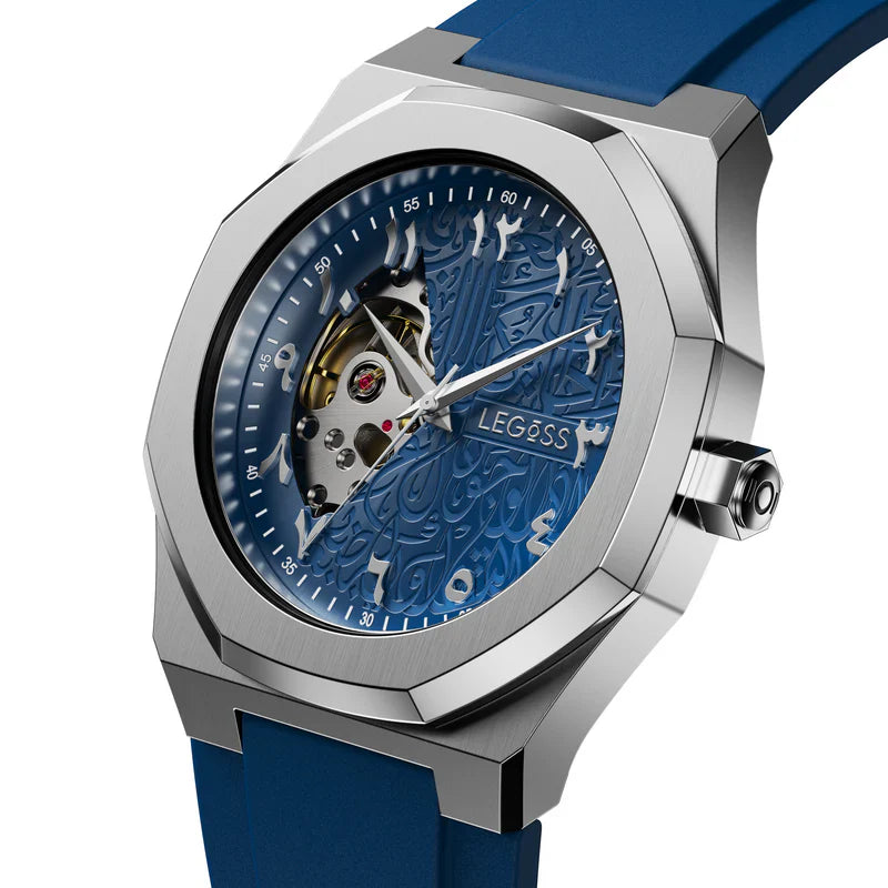 Angled view of a men’s Arabic dial automatic watch, highlighting the blue skeleton dial